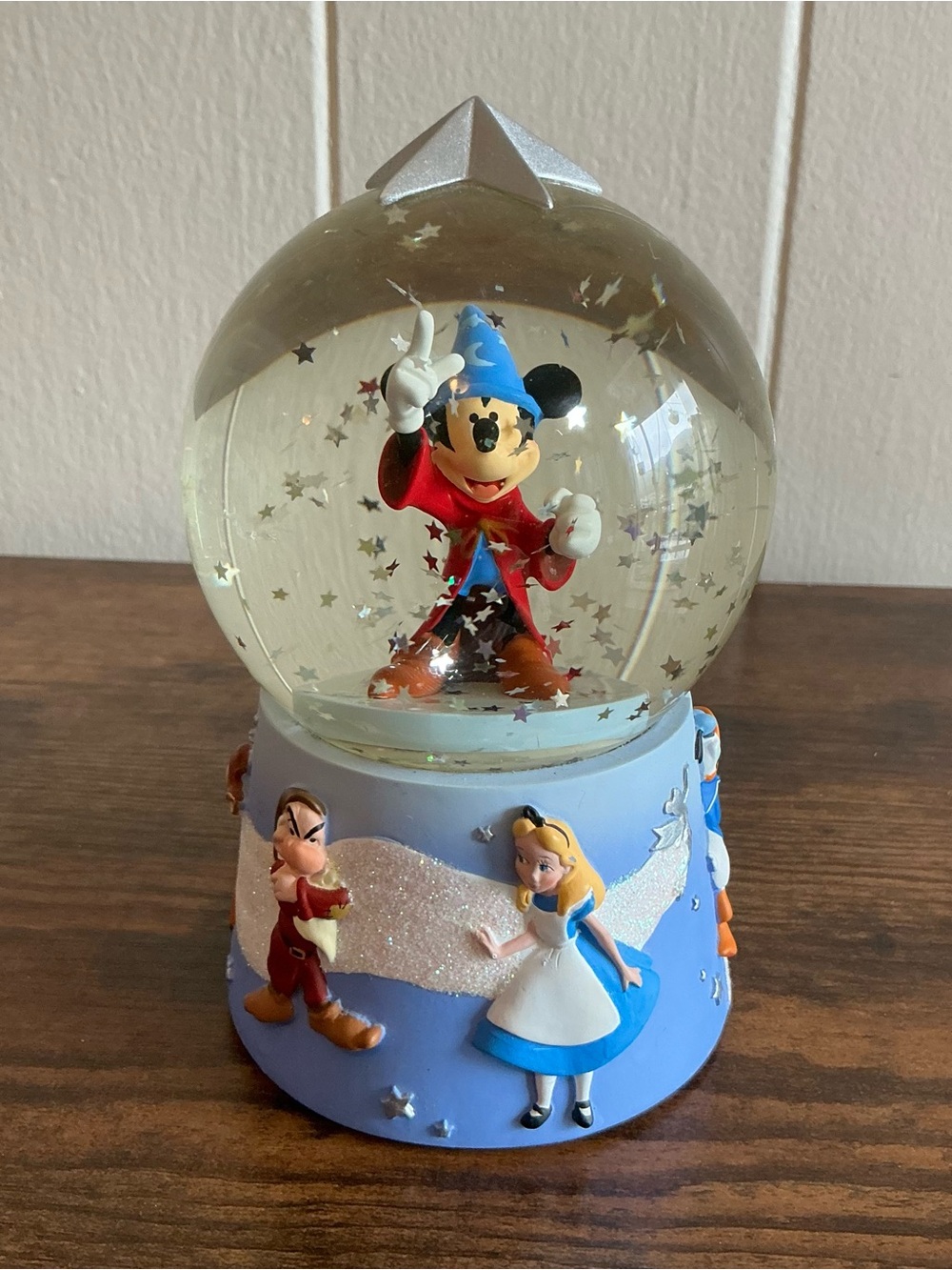 a vintage Disney Store Fantasia Mickey Mouse Sorcerer's Apprentice snow globe